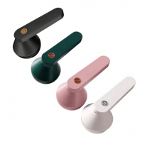 Quatro unidades do papa bolinhas elétrico dispostas em diagonal, nas cores preta, verde escuro, rosa e branca, com design ergonômico e botão central.
